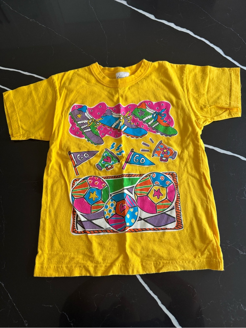 Vintage 90s Kids Yellow Graphic T-Shirt with Colorful Sports Print